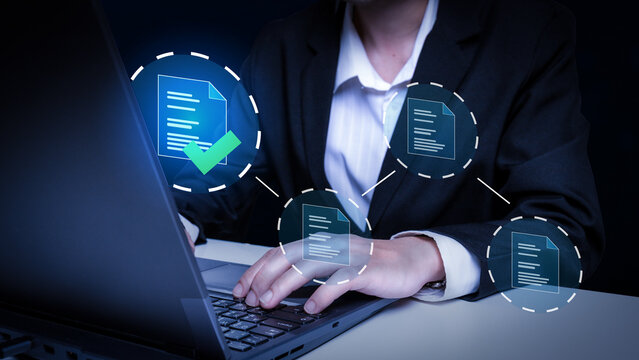 Digital Document Verification: A professional diligently works on a laptop, with digital documents floating in the foreground, each bearing a prominent checkmark signifying completion.