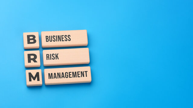 Business risk management concept with wooden blocks and BRM abbreviation