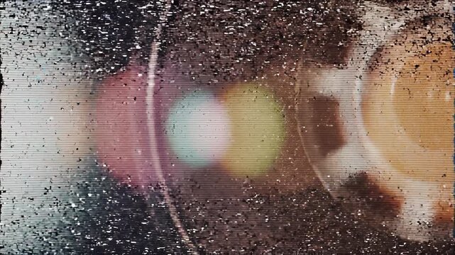 Close Up Of A Vintage Audio Cassette Tape Reel And Sprocket With Warm Lens Flare And Grainy Texture