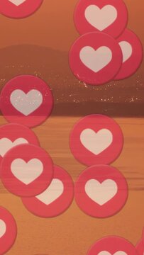 Vertical video: Pink heart tokens being dropped, piling then sliding and clearing bay to show likes