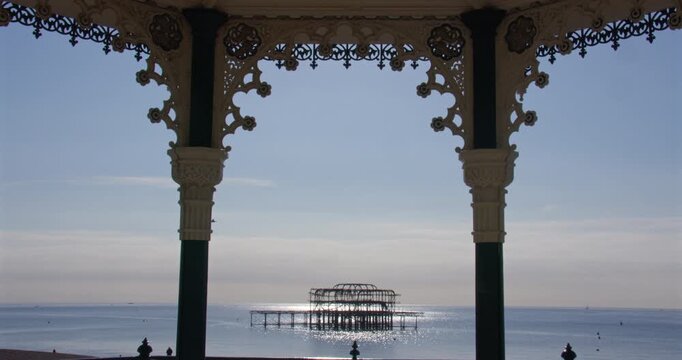 Extra Wide shot of the Dialect Brighton West pier from the Brighton Beach Bandstand.