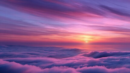 Fototapeta premium Experience the breathtaking beauty of a vibrant sunrise filled with hues of pink and burgundy, illuminating the sky above a thick blanket of fluffy clouds. A moment of pure tranquility unfolds
