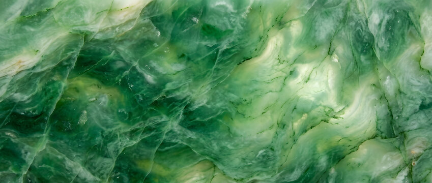 This is a close-up view of polished green jade stone, showcasing flowing veiny texture and natural color gradients with glossy, smooth surface details.