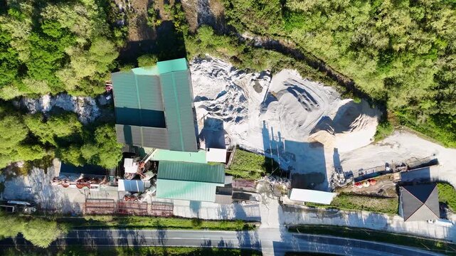Aerial top down view of industrial cement mixing plant