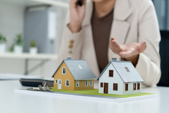 Frustrated Asian Female Real Estate Agent Arguing on Phone