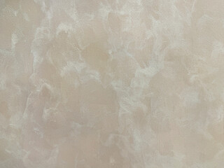 Light beige textured paint washed on a wall or panel, in random lime washed pattern. Seamless...