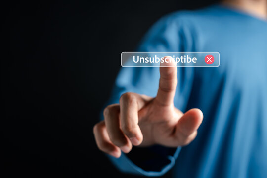 Unsubscribe and cancel membership concept. Person pointing finger at unsubscribe button symbol.