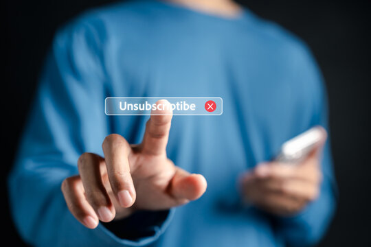 Unsubscribe and cancel membership concept. Person pointing finger at unsubscribe button symbol.