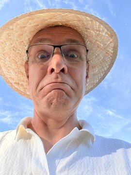Homme au chapeau de paille