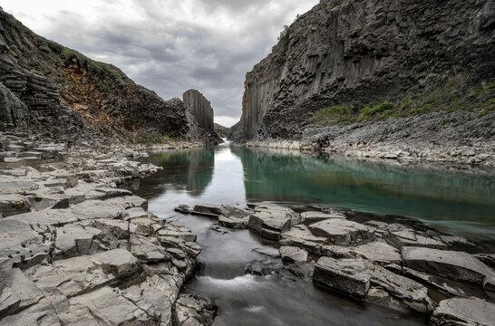 Stu&eth;lagil Canyon, turquoise river between basalt columns, Egilsstadir, Iceland