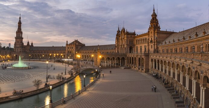 Illuminated Plaza de Espa&ntilde;a at dusk, Seville, Andalusia, Spain