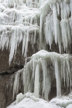 Long icicles on a rock face, Partnachklamm in winter, near Garmisch-Partenkirchen, Upper Bavaria, Bavaria, Germany