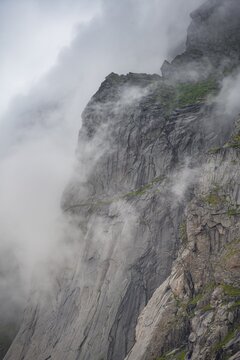 View from Helvetestinden to rock face of Mount Storskiva, Lofoten, Nordland, Norway