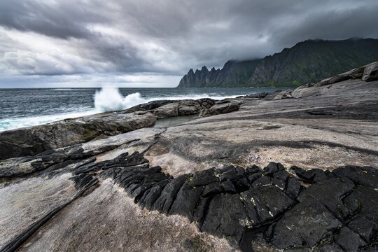 Rocky coast of Tungeneset, rocky peak Devils Teeth, Devil's Teeth, Okshornan, stone fjords, Senja Island, Troms, Norway