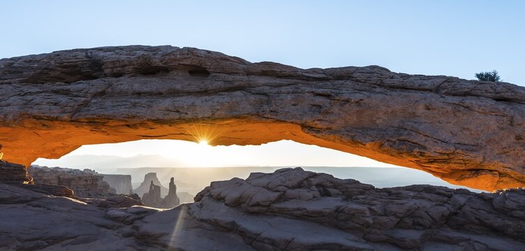 View through Natural Arch, Mesa Arch, Sunrise, Grand View Point Road, Island in the Sky, Canyonlands National Park, Moab, Utah, USA