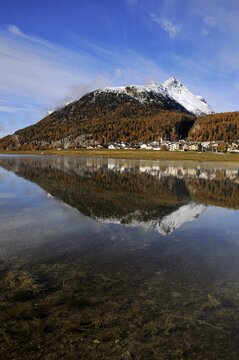 Lake Silvaplana with village of Silvaplana, Mt Piz da la Margna at back, St. Moritz, Engadine, Grisons, Switzerland, Europe