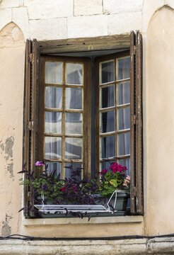 Wooden windows with flowers, Bonifacio, Corsica, France