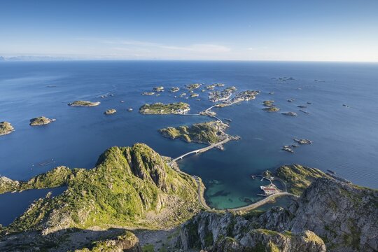 View of fishing village Henningsvaer from the top of Festv&aring;gtinden, Small islands connected by road and bridges, Austv&aring;g&oslash;ya, Lofoten, Norway