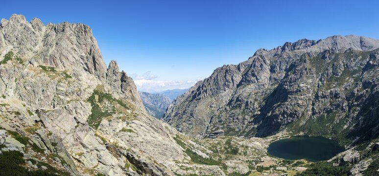 Mountain lake Lac de Melo, view from the Lac de Capitello, mountains in background, Restonica high valley, source of the Restonica River, Corte, Haute-Corse, Corsica, France