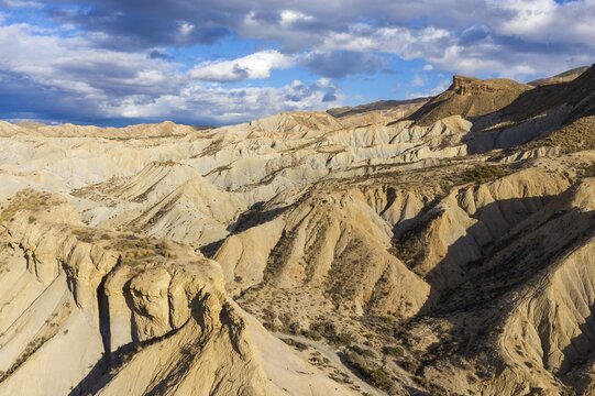 Bare ridges of eroded sandstone in the Tabernas Desert, aerial view, drone shot, Almeria province, Andalusia, Spain
