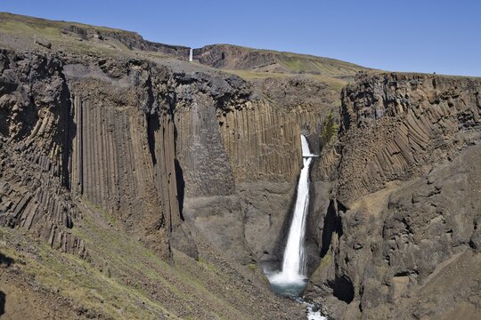 Basalt columns lining Litlanesfoss Waterfall, Egilssta&eth;ir, Iceland, Atlantic Ocean