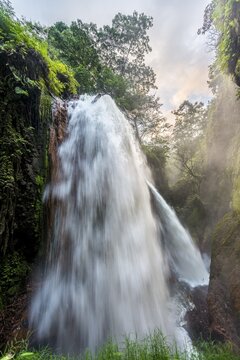 Waterfall in ravine, Air Terjun Belawan, Kalianyar, Sempol, Eastern Java, Indonesia