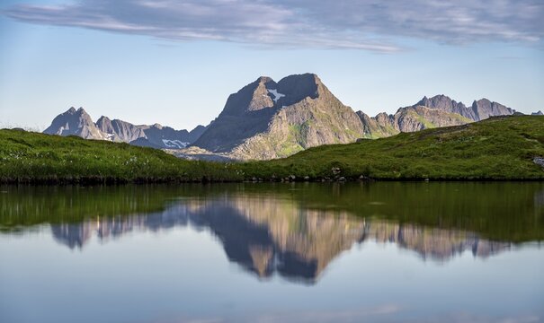 Mountain reflected in a lake, Fredvang, Lofoten, Nordland, Norway