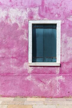 Pink wall with window, colorful house wall, closed shutters, morbid, colorful facade, Burano Island, Venice, Veneto, Italy