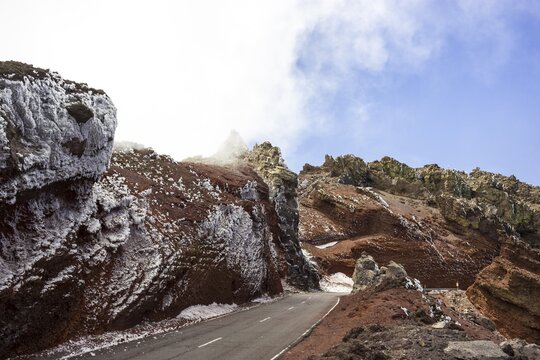 Road to the Roque de los Muchachos, ice-covered volcanic rocks, fog, La Palma, Canary Islands, Spain