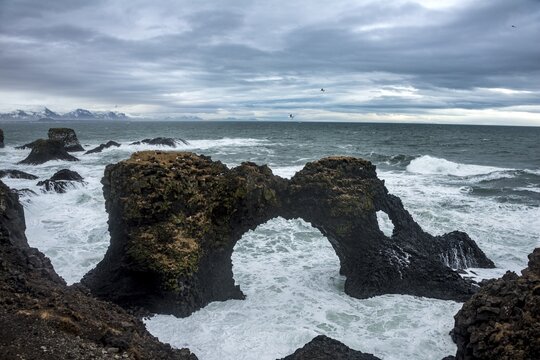 Gat Velcro, arch in the sea, waves at the sea, bad weather, West Iceland, Iceland