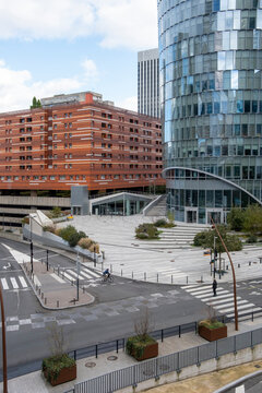 Modern corporate office architecture defines Paris business district at La Defense with urban plaza space and contemporary district skyline and city context
