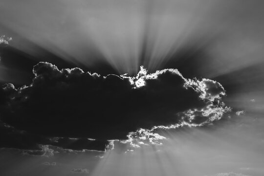 Sun shining behind a cloud, Etosha National Park, Namibia