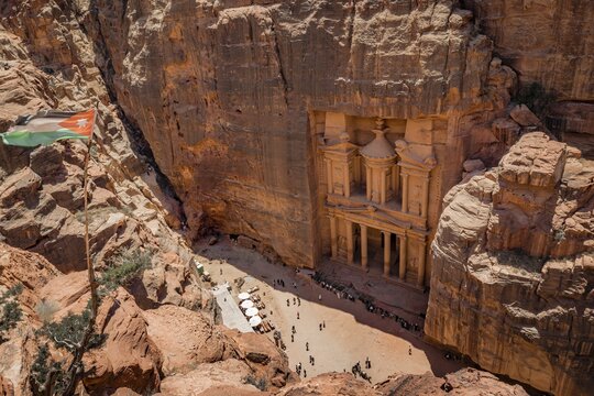View from above into the gorge Siq, Pharaoh's treasure house carved into rock, facade of the treasure house Al-Khazneh, Khazne Faraun, mausoleum in the Nabataean city Petra, near Wadi Musa, Jordan