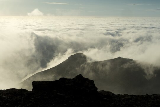 Clouds moving in, summit area of Mt Sl&aelig;ttaratindur, Eysturoy, Faroe Islands, Denmark