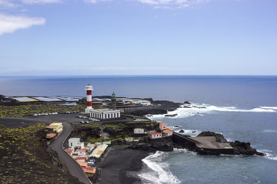 Coastline with Tenegu&iacute;a saltworks, old and new lighthouse, south cape Punta de Fuencaliente, La Palma, Canary Islands, Spain