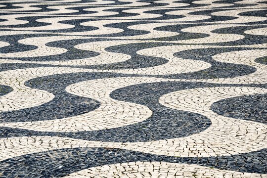 Black and white undulating plaster motif, Rossio, Pra&ccedil;a Rossio, Lisbon, Portugal