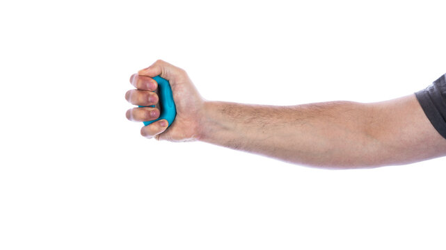 Man's hand with rubber ring used as hand expander (hand gripper). Hand grip strengthening tool. Isolated on white.