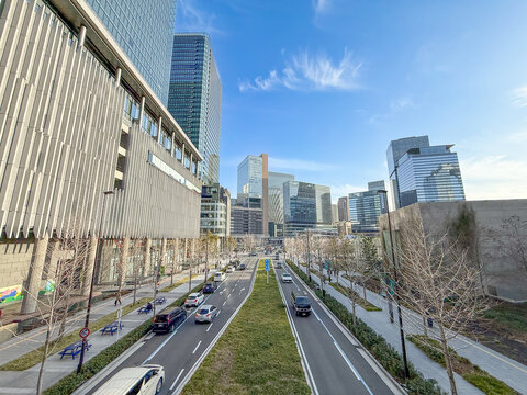 Modern cityscape around Osaka Station with office buildings and blue sky, Osaka Japan