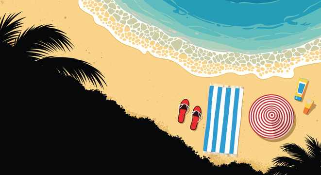 Top down view of a sandy beach with a blue ocean wave and summer vacation items like a towel and beach umbrella.