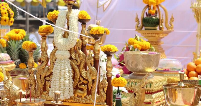 Ritual Baisi (Bai-sri) of Traditional Thai ceremonial offering table with fruits, marigolds, and ornate decorations, Consecration, Pre-Production Blessing Ceremony, Culture, Spirituality, Auspicious