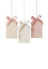 Fototapeta premium Three hanging gift tags with pink ribbons isolated on transparent background