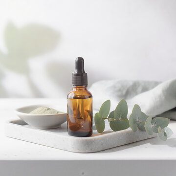 Medicinal plants with cannabis leaves on a white tray display antioxidant properties
