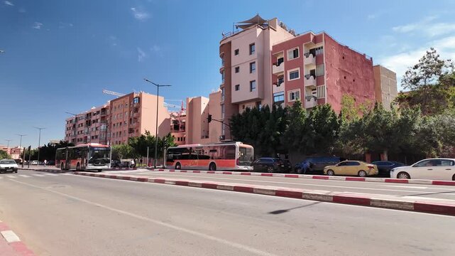 Public street view featuring architecture, mobility and everyday urban life in Marrakech, Morocco &mdash; May 9, 2026
