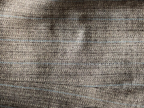 Close up of Dark Grey Textured Fabric with Subtle Parallel Stripes