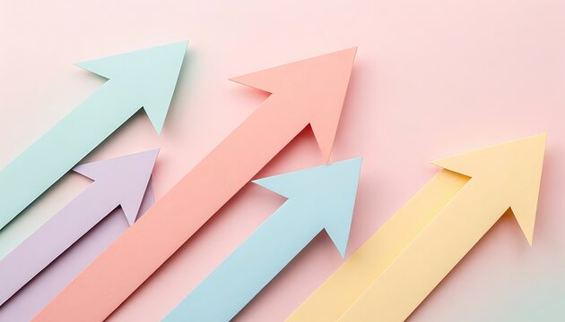 Colorful paper arrows pointing upwards on a soft pink background