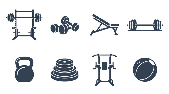 Various gym equipment including weights, dumbbells, and exercise benches arranged for fitness training
