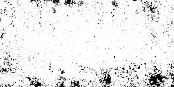 Grunge textured background with black splatters and white space for design or advertising use with a distressed look