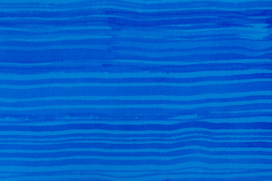Layered watercolor texture in deep blue tones