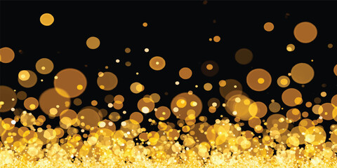 Golden magic bokeh creates a glowing holiday wallpaper as shiny drops of gold glitter and shine across the night window and ground in a bright defocused celebration of light © Hena Akter