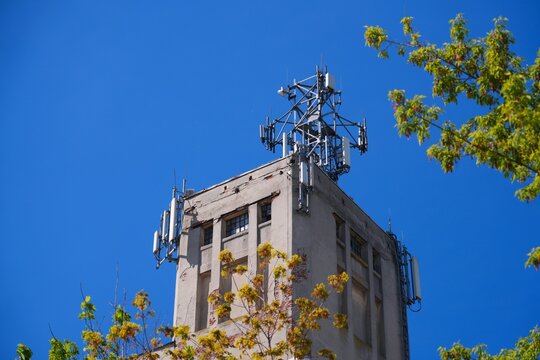 Mobile base station rooftop infrastructure in Europe. Mobile phone transmitters in Lodz, Poland.